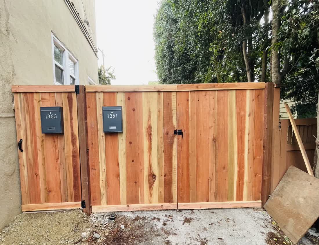 Custom cedar fence with built-in mailboxes